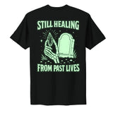 Glow in the Dark Still Healing from Past Lives Unisex T-shirt- Infused With Clear Quartz Crystals